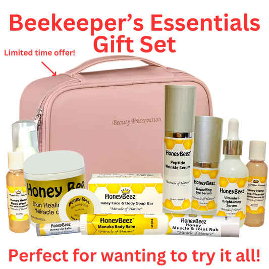 Beekeeper's Essentials Gift Set with pink carrying case and various skincare products on a white background.